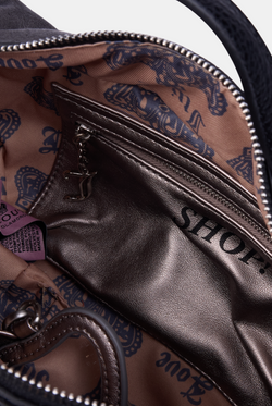 Displays the Grey 'Juicy' branded crest velour hobo bag featuring some juicy branding 