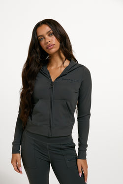 Displays a model wearing the Raven 'Juicy' branded Active Fitted Hoodie