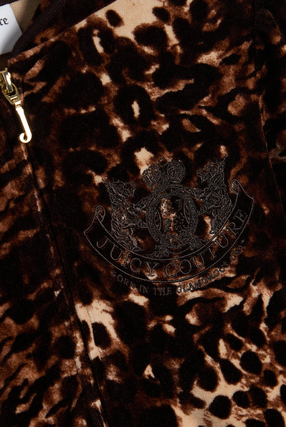 Displays the Java 'Juicy' branded Abstract Animal Puff Sleeve Robyn Hoodie featuring the juicy couture branded logo