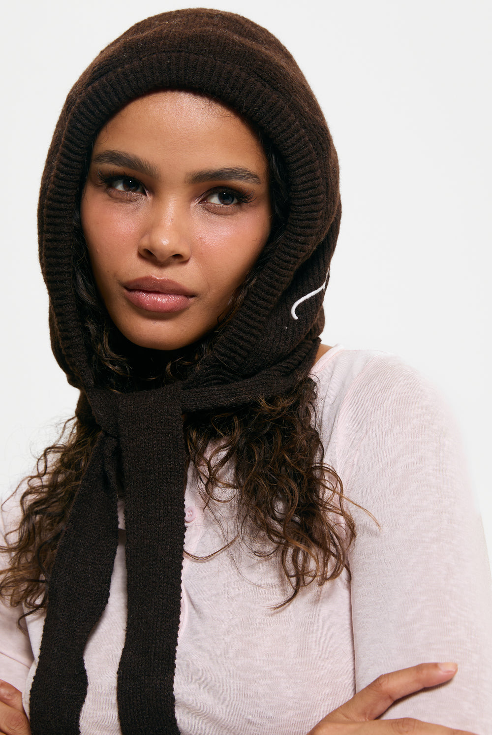 Displays a model wearing the Java 'Juicy' branded Bonnet With Bow