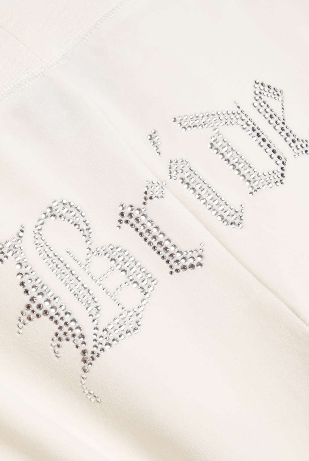 Displays the Bridal 'Juicy' branded classic velour low rise track pants featuring the bridal branding 