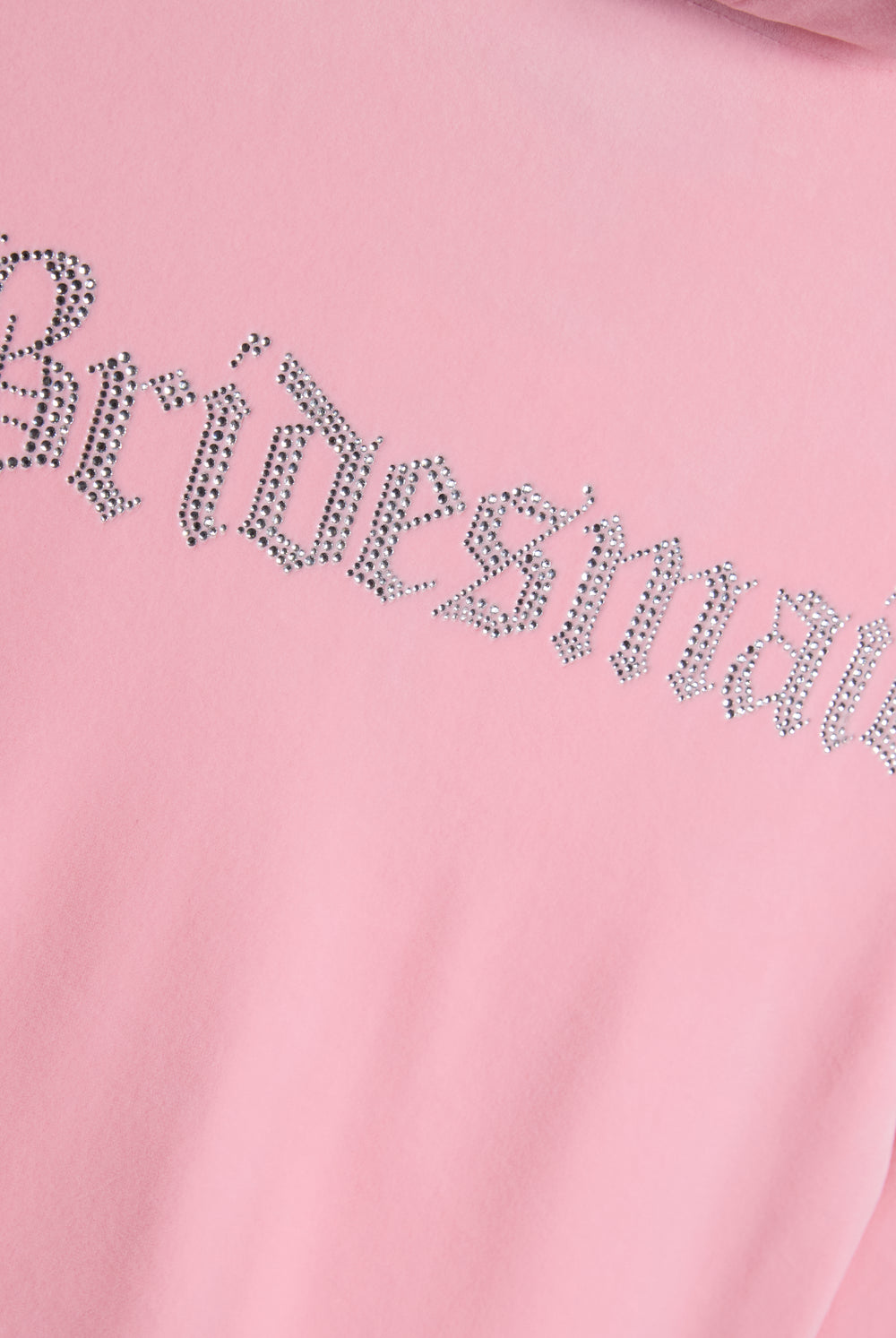 Displays the Juicy Pink 'Juicy' branded bridesmaid classic velour hoodie featuring the juicy branding 'bridesmaid' logo