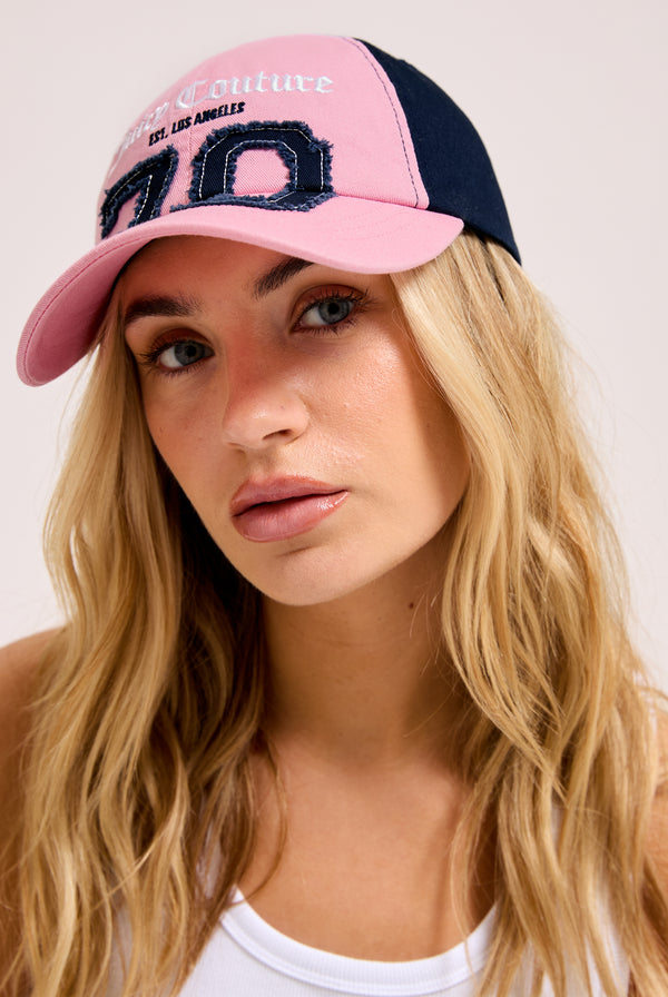 Displays the Pink/Night Sky 'Juicy' branded sky cap 
