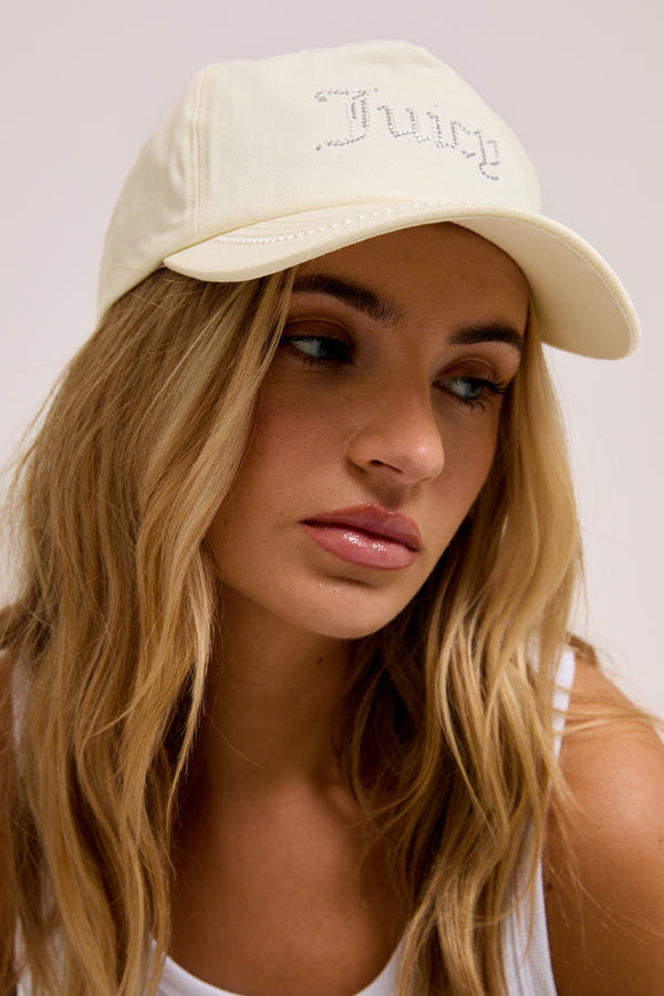 Displays a model wearing the Ecru Diamanté 'Juicy' branded cotton cap 