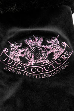 Displays the Black 'Juicy' branded Dog Crest Velour Stocking featuring the details on the branding 