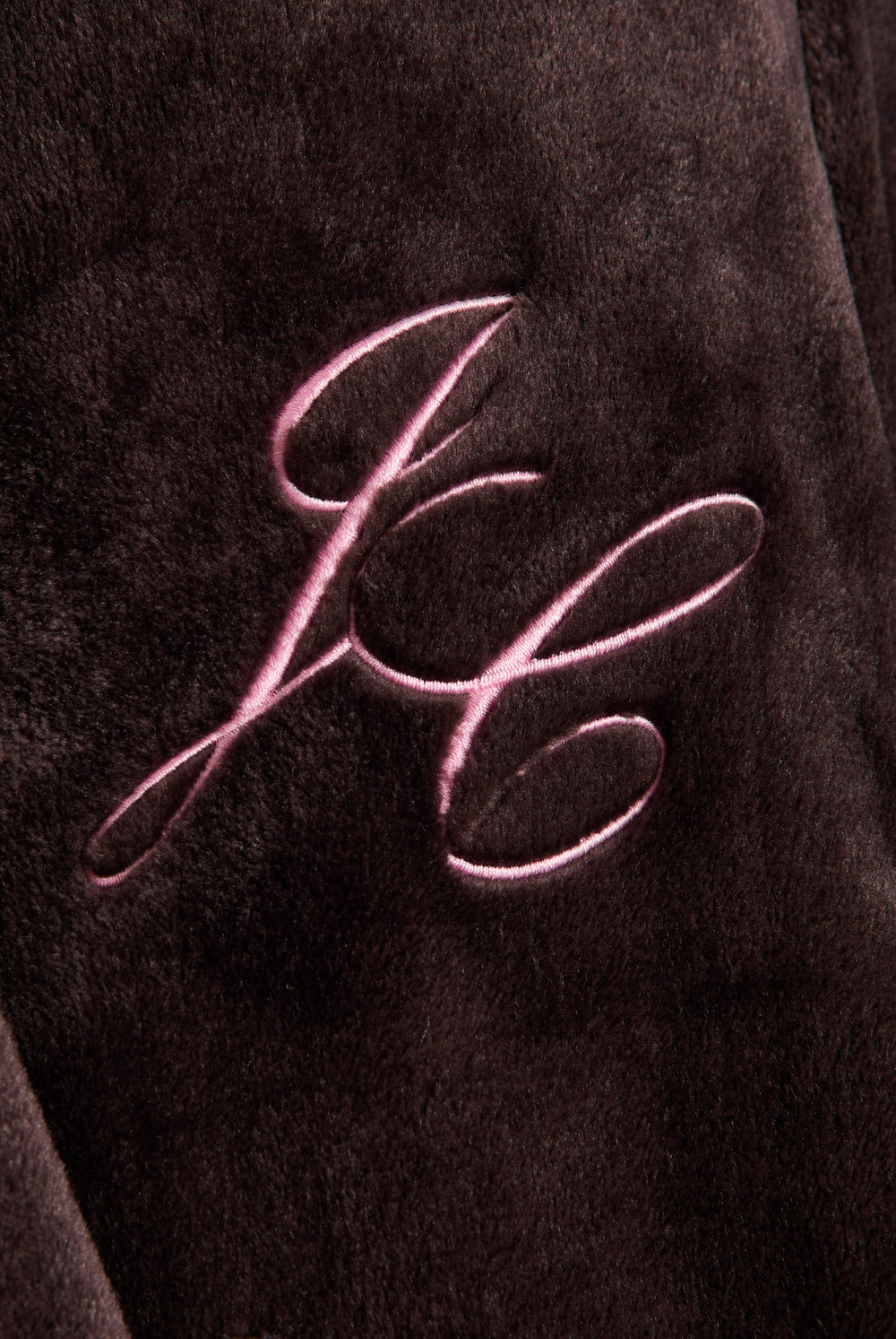 Displays the Java 'Juicy' branded crown plush hooded robe featuring the juicy branding 