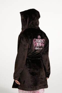 Displays a model wearing the Java 'Juicy' branded crown plush hooded robe 