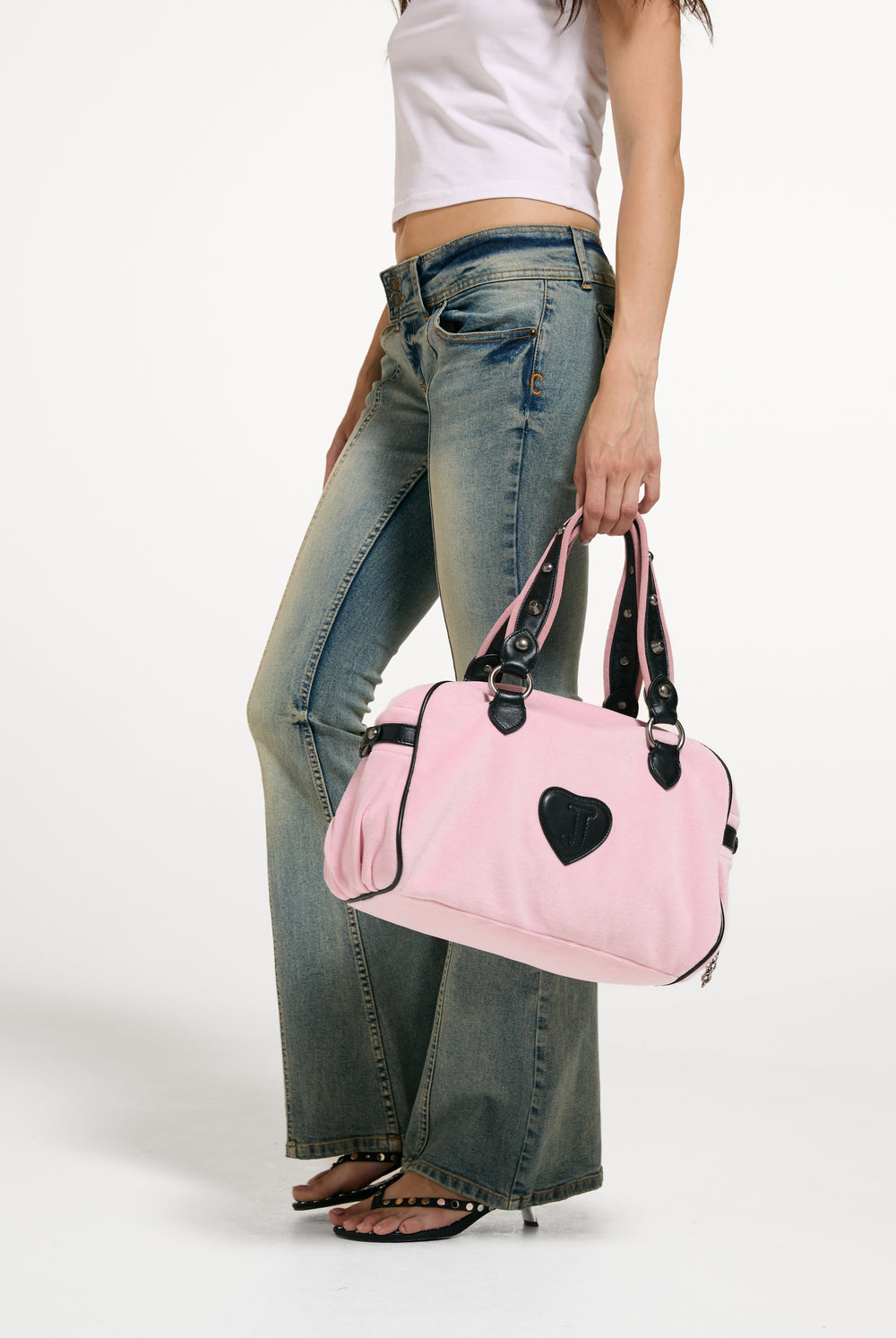Displays a model wearing the Cherry Blossom 'Juicy' branded Bowling Daydreamer Bag