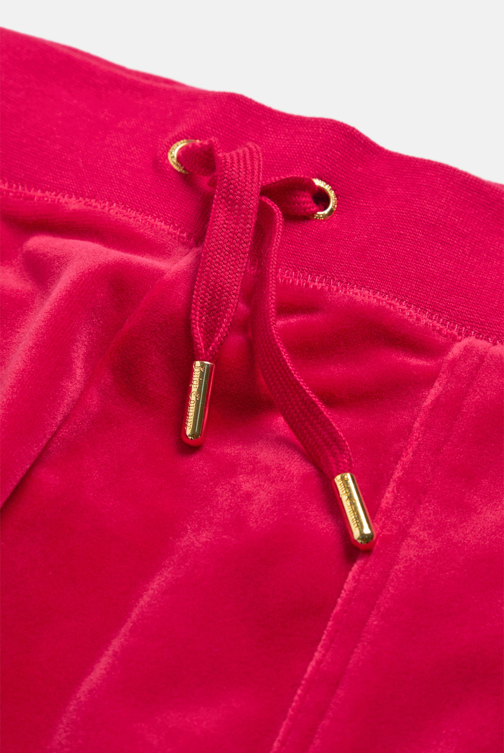 Displays the Persian Red / Gold 'Juicy' branded Classic Velour Del Ray Pocketed Bottoms featuring the close up on the details 