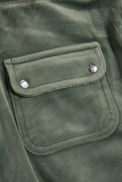 Displays the Thyme 'Juicy' branded classic velour del ray pocketed bottoms featuring the pockets  