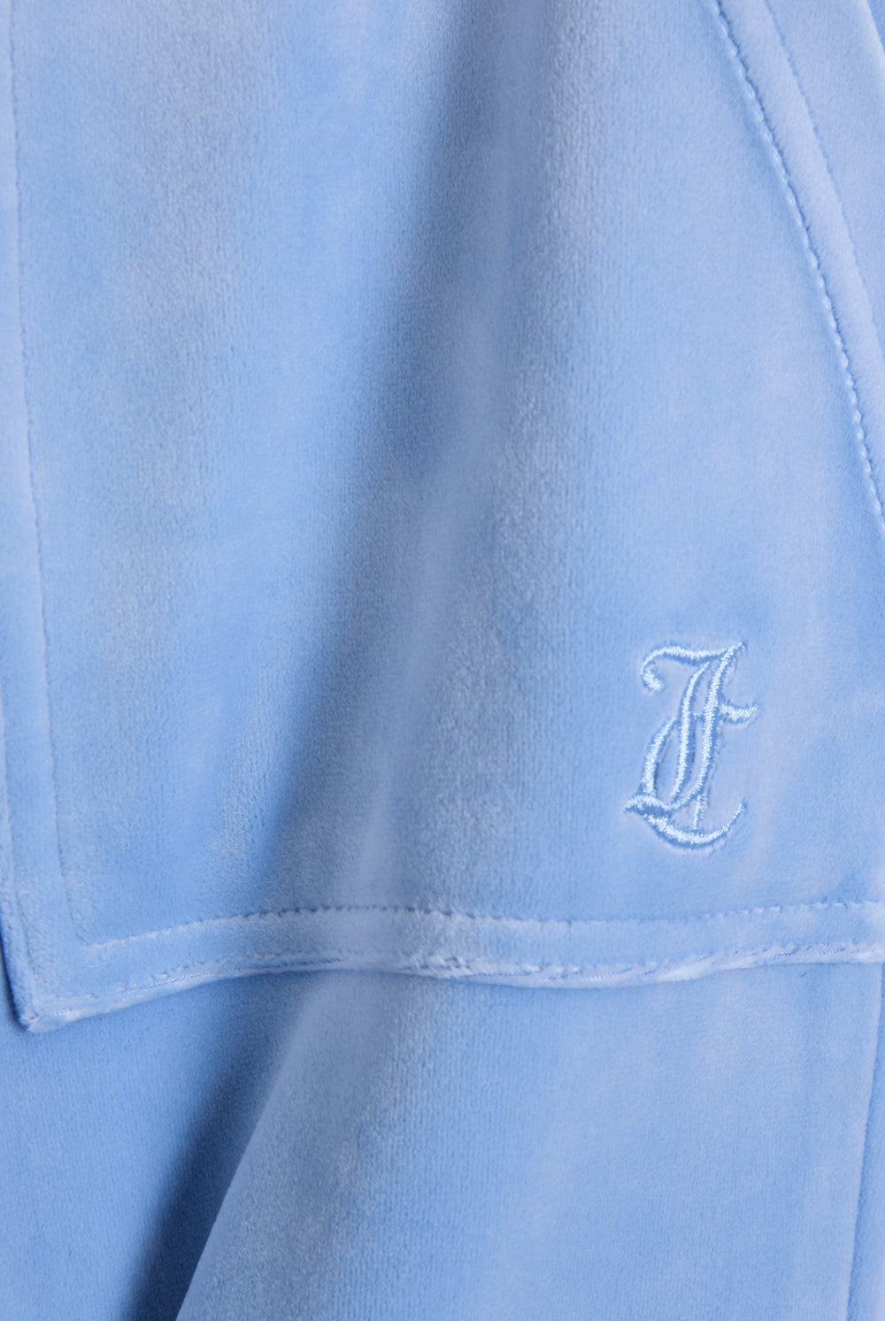 Displays the Della Robia classic 'Juicy' branded velour del ray pocketed bottoms featuring the juicy logo