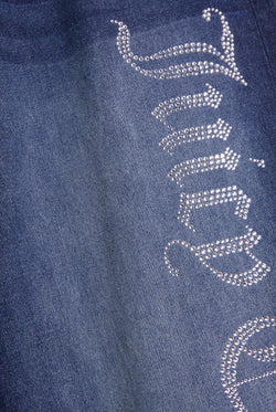 Displays the mid Wash 'Juicy' branded wide leg Diamanté jeans featuring the juicy couture branding 