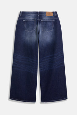 Displays the mid Wash 'Juicy' branded wide leg Diamanté jeans 