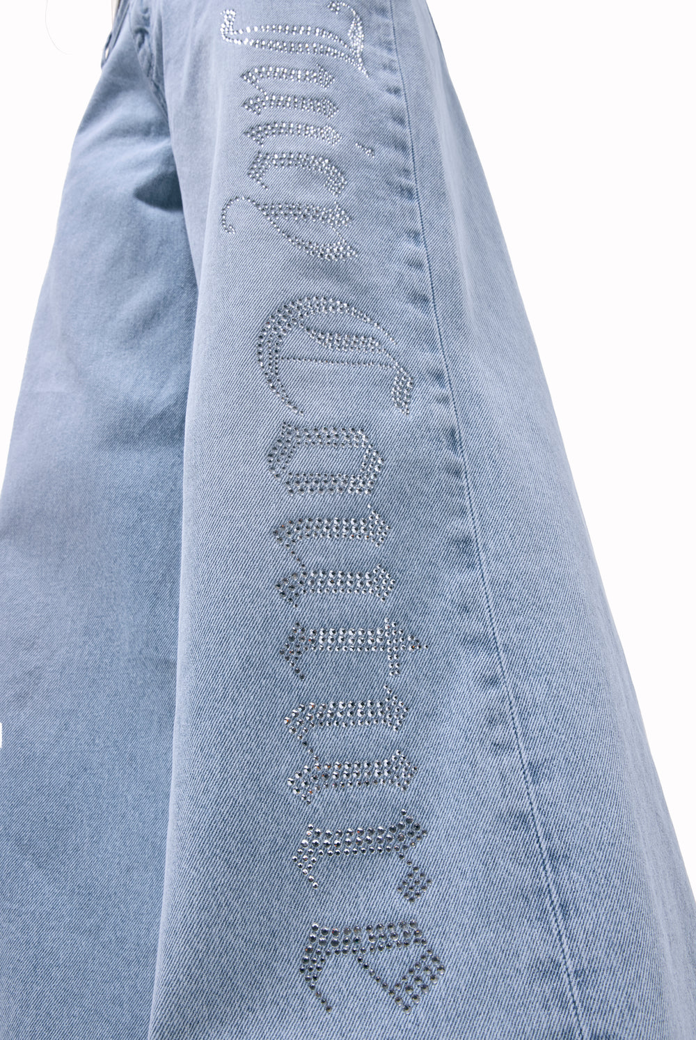 Displays the Light Wash Diamanté 'Juicy' branded wide leg jeans 