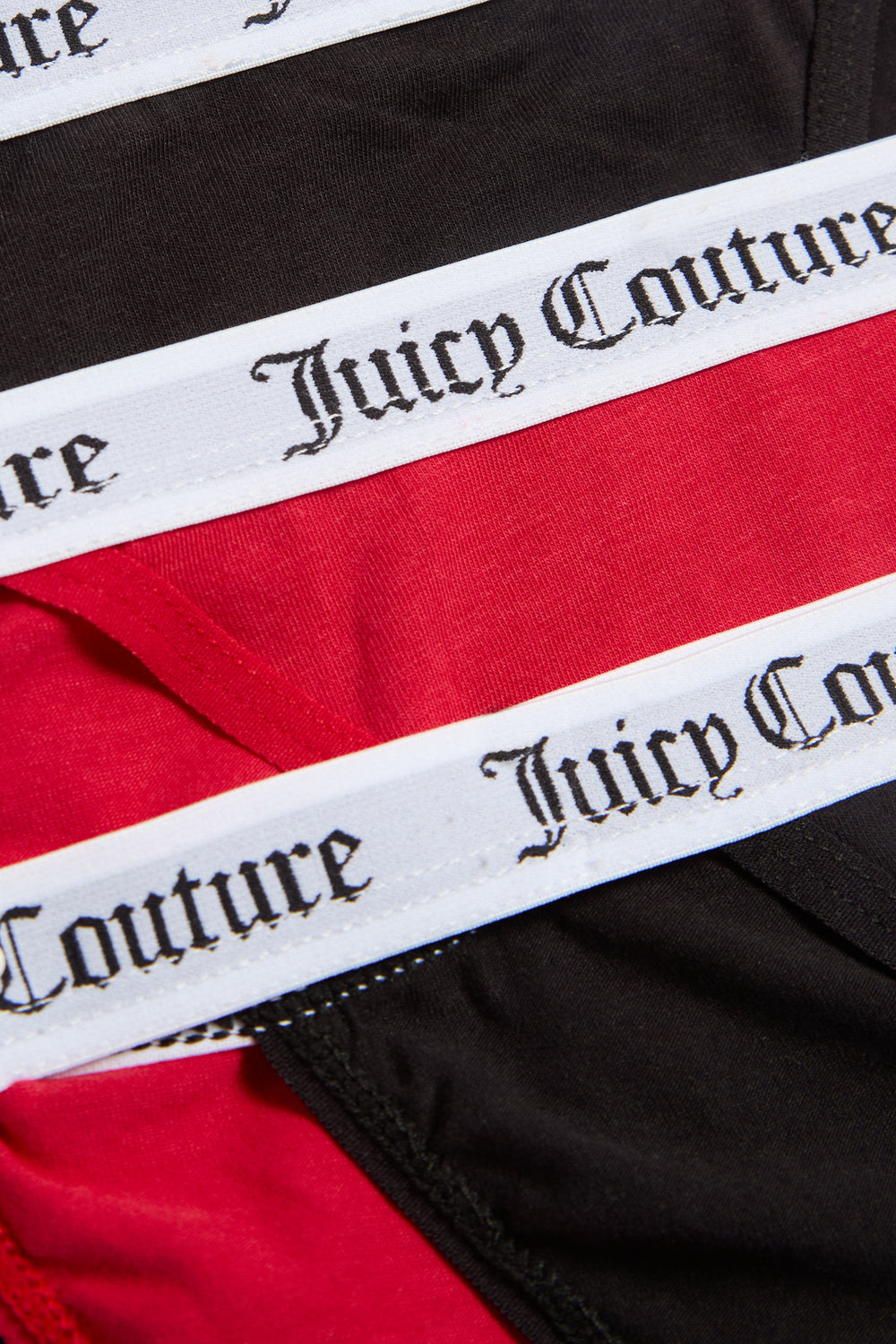 Displays all 3 of the black and red 'juicy' branded Cotton Branded Waistband briefs included in the Multi Pack Of 3 featuring the details of the juicy branded 