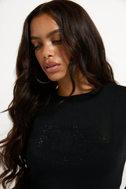 Displays a model wearing the Black 'Juicy' branded Diamanté Dog Crest Long Sleeve T-Shirt