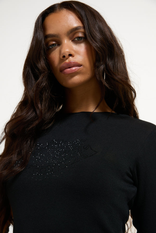 Displays a model wearing the Black 'Juicy' branded Diamanté Dog Crest Long Sleeve T-Shirt