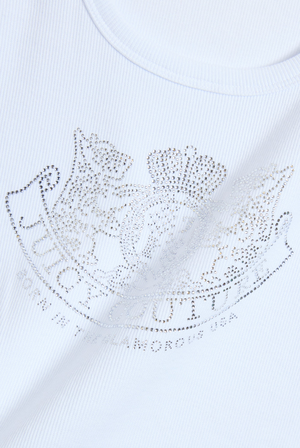 Displays a model wearing the White Diamanté 'Juicy' branded Dog Crest vest featuring the Juicy Logo