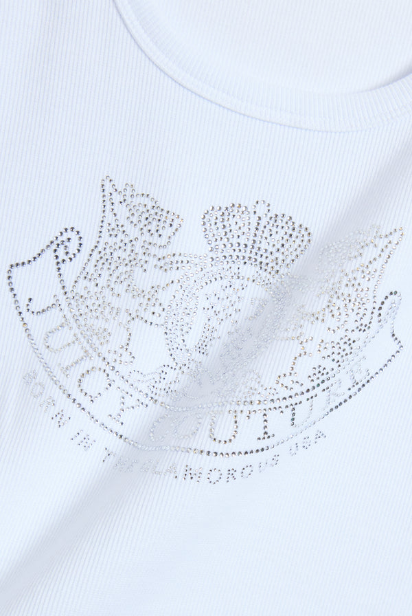 Displays a model wearing the White Diamanté 'Juicy' branded Dog Crest vest featuring the Juicy Logo