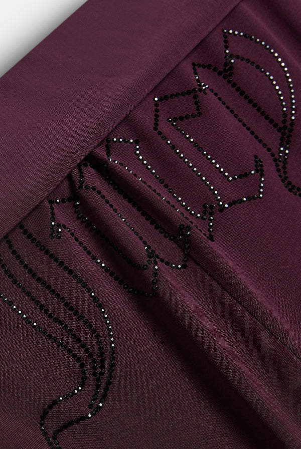 Displays the Winetasting 'Juicy' branded Belted Flare Trousers featuring the juicy branding 