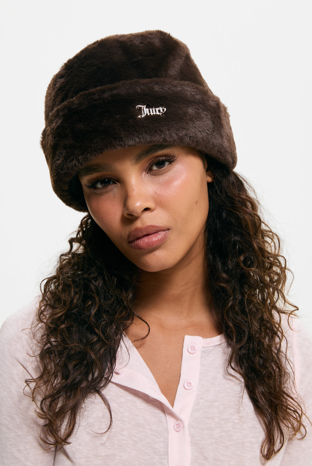 Displays a model wearing the Java 'Juicy' branded Faux Fur Hat