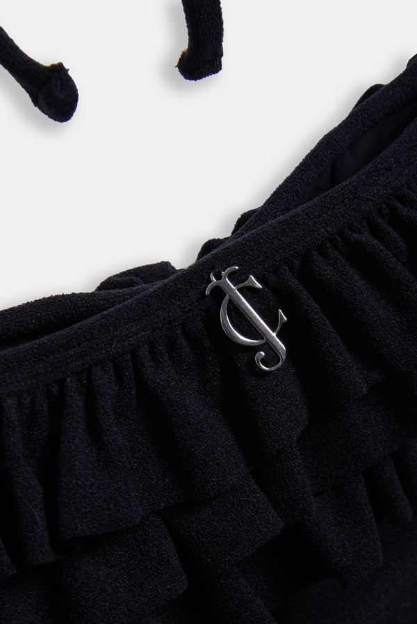 Displays the Black Heritage 'Juicy' branded towelling frilly bikini featuring the juicy Couture branding 