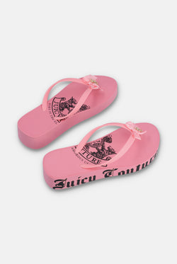 Displays a pair of the Pink 'Juicy' branded heritage wedge sliders 