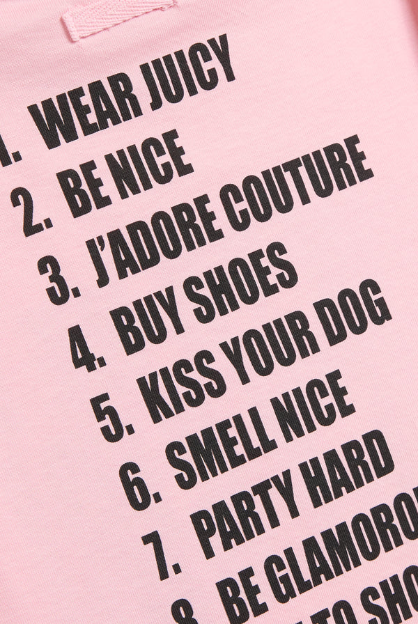 Displays the Juicy Pink 'Juicy' branded HOW TO BE A JUICY GIRL T-Shirt