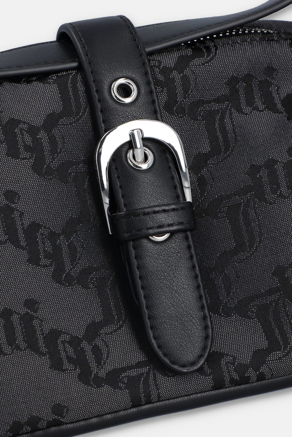Displays the Black jacquard 'Juicy' branded soft buckle bag 