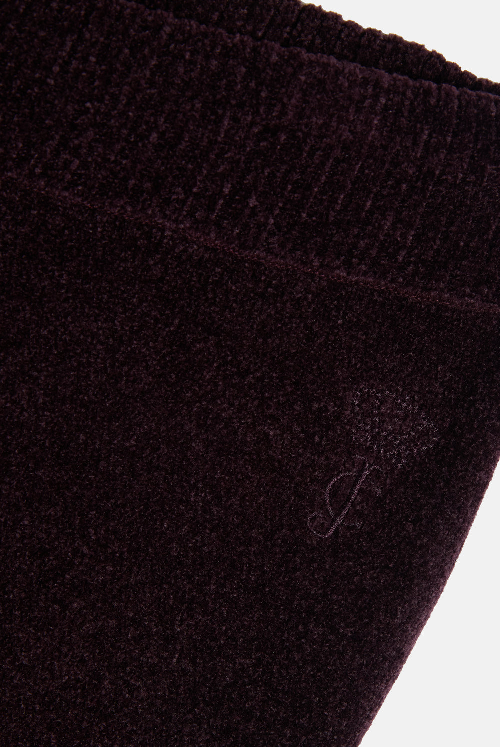 Displays the Winetasting 'Juicy' branded Luxe Knit Straight Leg Pant featuring the juicy branding 