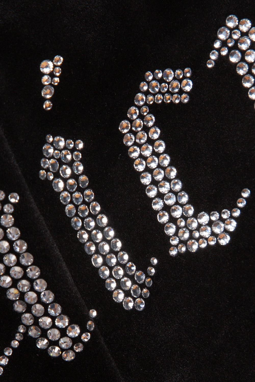 Displays the Black 'Juicy' branded diamanté capri featuring the juicy branding 