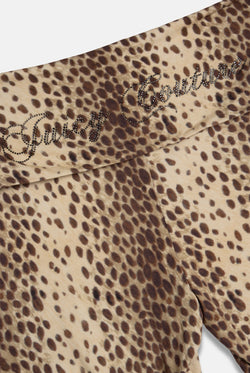 Displays the natural cheetah print 'juicy' branded roll down capri featuring the juicy branding 