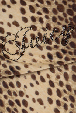 Displays the natural cheetah print 'juicy' branded roll down capri featuring the juicy branding 