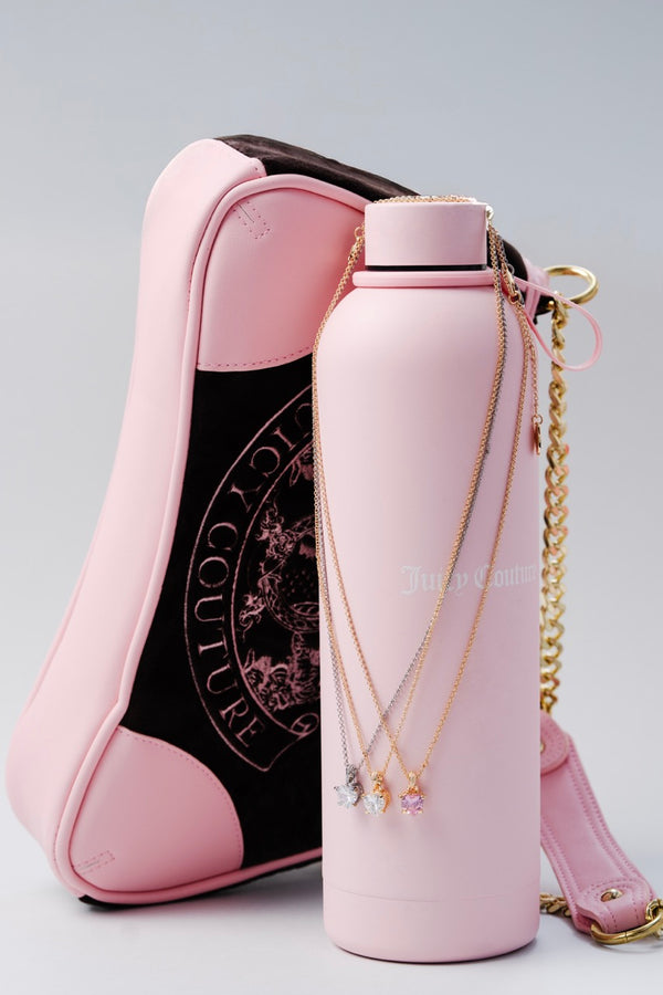 Displays Juicy accessories featuring the  'Juicy' Silver Tone Solitaire Crystal Heart Pendant