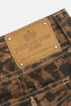 Displays the Animal 'Juicy' branded low rise flared jeans featuring the juicy couture jeans branding 