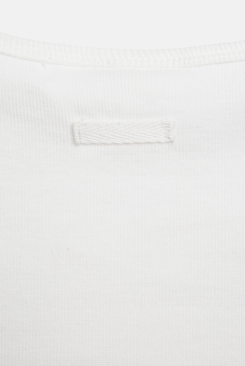 Displays the White 'Juicy' branded Choose juicy vest top 