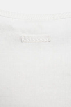 Displays the White 'Juicy' branded Choose juicy vest top 