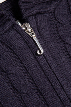 Displays the Night Sky 'Juicy' branded Cable Knit Zip Up Hoodie featuring the juicy branding on the zip