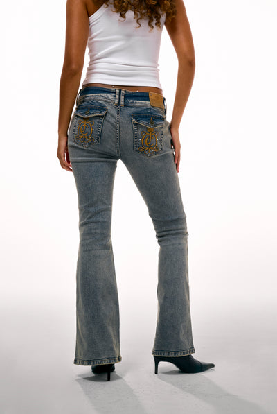 VINTAGE WASH LOW RISE FLARED EMBROIDERED JEANS