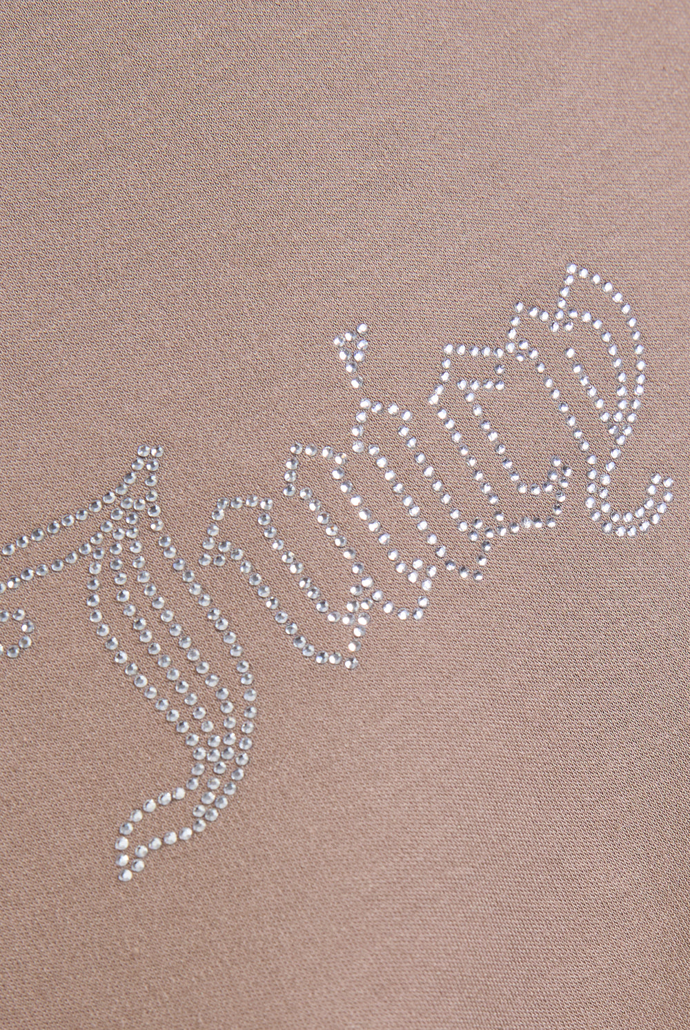 Displays the Fungi Raglan 'Juicy' diamanté baby tee featuring the juicy branding 