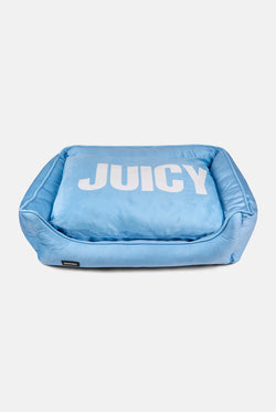 Displays the Powder Blue 'Juicy' branded Pet Bed