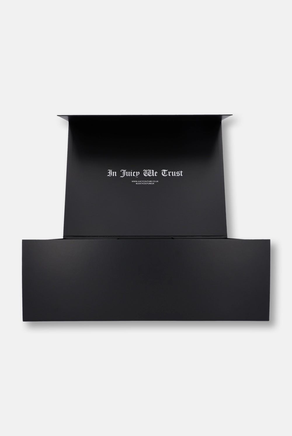 Displays the 'Juicy Couture' Gift Wrapping packaging 