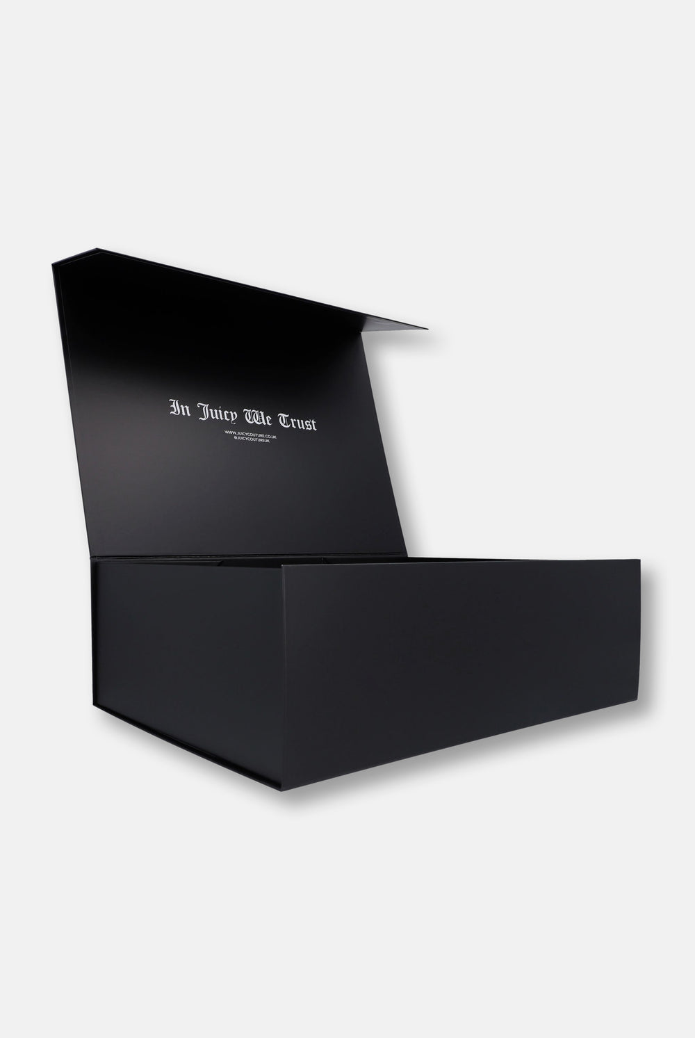 Displays the 'Juicy Couture' Gift Wrapping packaging 