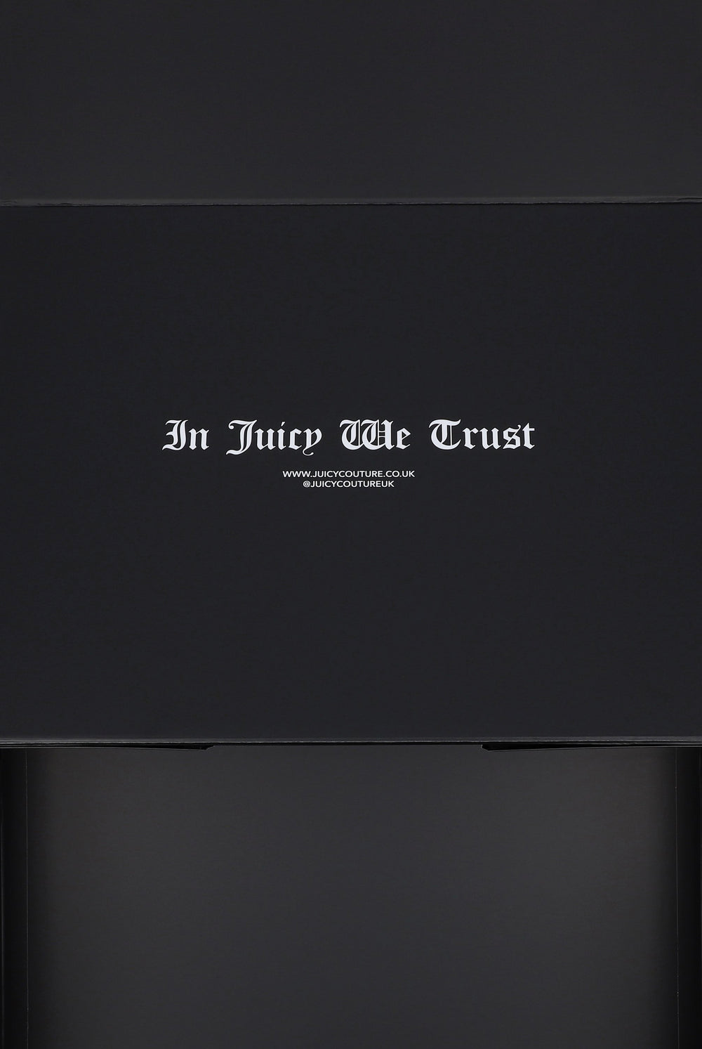 Displays the 'Juicy Couture' Gift Wrapping packaging 