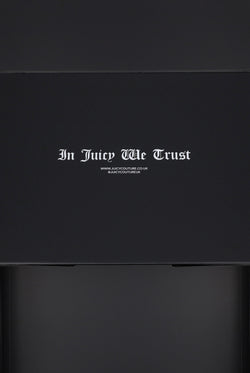 Displays the 'Juicy Couture' Gift Wrapping packaging 