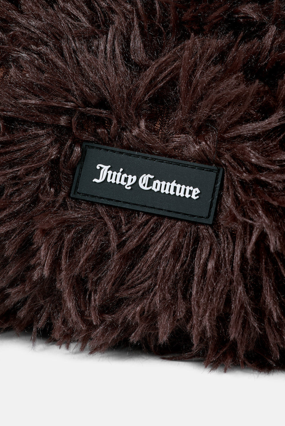 Displays the Java 'juicy' branded Fluffy Heart Pet Bed featuring the details on the juicy Couture branding 