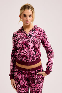 Displays a model wearing the Pink Leopard Print 'Juicy' branded Zip through hoodie 