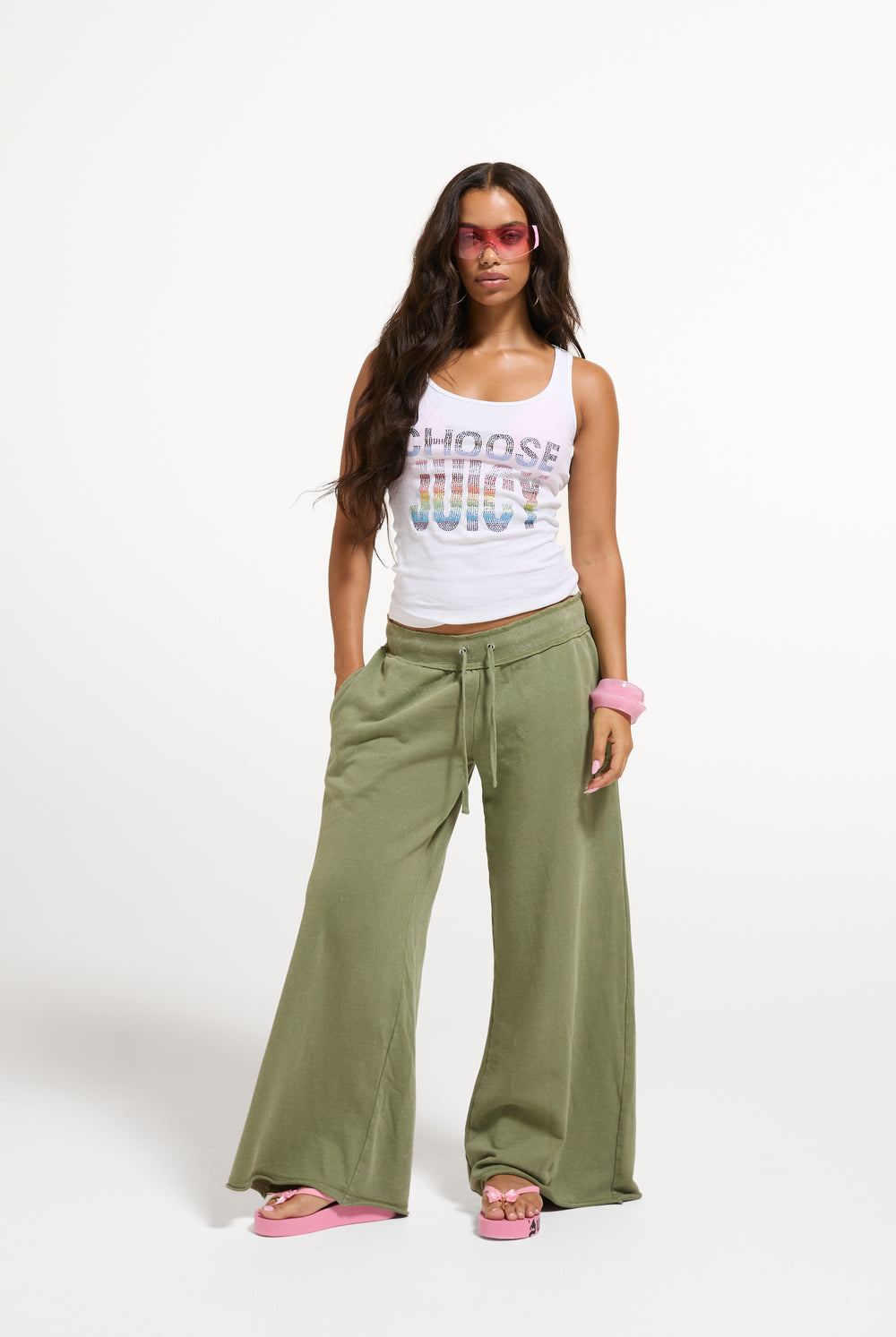 Displays a model wearing the White 'Juicy' branded Choose juicy vest top 