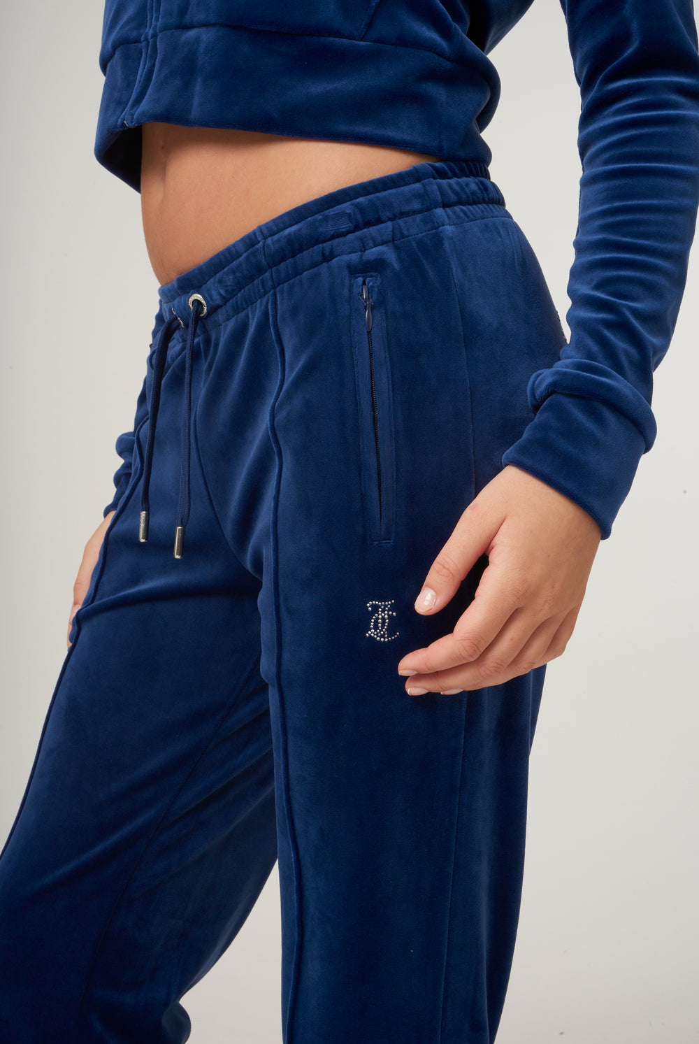 Displays the Blue Depths 'Juicy' branded velour diamanté tracksuit bottom 