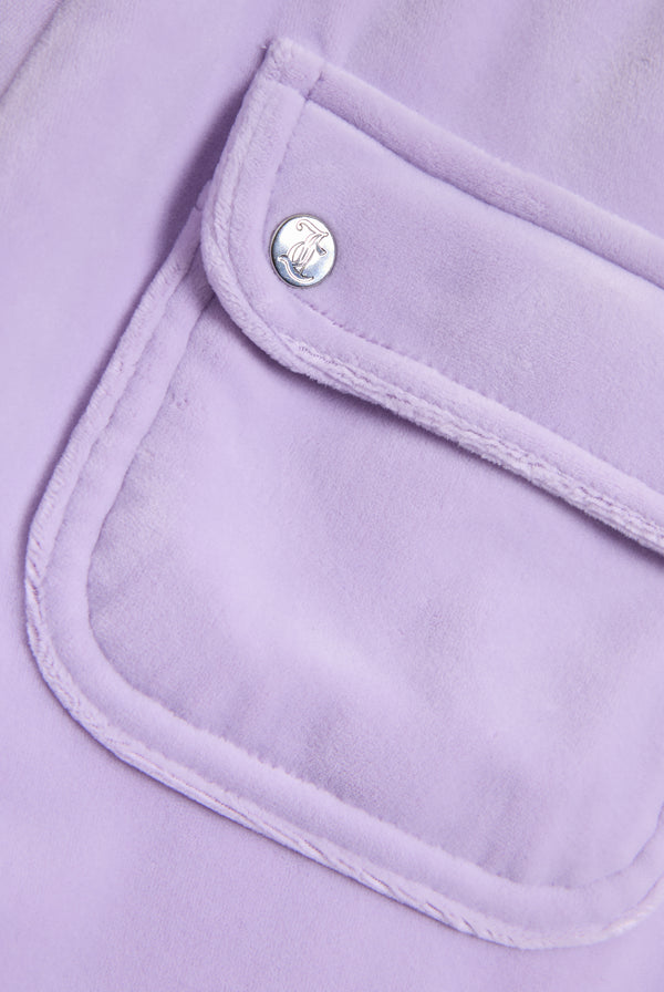 Displays the pastel lilac 'juicy' branded low rise flare classic velour track pant 